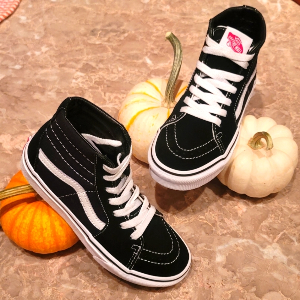 Vans Black/True White, 2.0 US. Never worn.